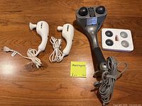 All items laid out: HoMedics massager, two Conair massagers, four heads