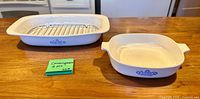 Two Blue Cornflower dishes and rack on countertop