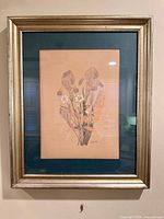 Front view of framed floral watercolor and ink drawing