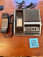 Top view of General Electric 7-4735 clock radio telephone with handset and power cord