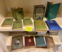 Front view of all twelve vintage history hardcovers on shelf