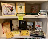 Shelf showing 13+ southern cookbooks in assorted bindings