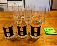 Group shot of all 9 glasses showing quantity and monogram styles