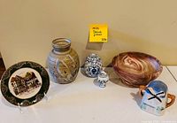 Group shot showing all six decorative ceramic and porcelain pieces