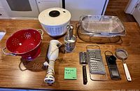 All eight kitchen prep items laid out on countertop