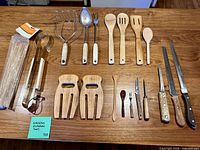 All kitchen utensils and knives arranged on tabletop