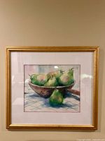 Front view of framed watercolor still life of pears
