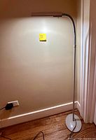 Full view of Ott-Lite floor lamp showing pole, gooseneck, head, and base