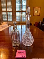 Both decanters side by side showing shapes, cut patterns, and stoppers