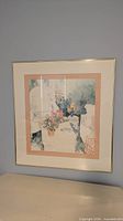 Floral print in gold-tone frame, wall mounted