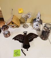 All six décor items arranged on table