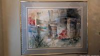 Large abstract landscape print in chrome metal frame, matted under glass