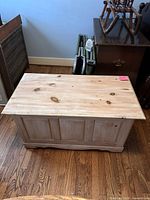 Closed chest showing front panels and unfinished wood