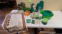All items laid out on table showing variety and condition