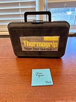 Closed carrying case showing Thermogrip label