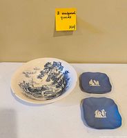 Top view showing transferware bowl and two blue jasperware trinket dishes