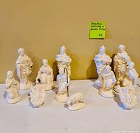 Front view showing all 11 white porcelain Nativity figures