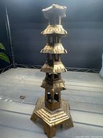 gold-tone multi-tier pagoda candle holder