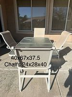 Full view of patio table with four chairs