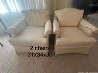 Front view of both armchairs with dimensions