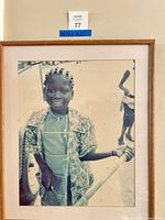 Front view showing full framed photograph