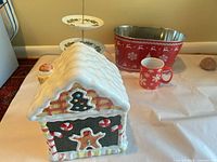 All four items grouped: cookie jar, stand, tub, mug