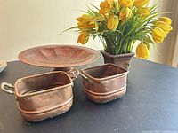 Pedestal compote and two handled planters grouped on tabletop