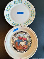 Front view of both plates showing designs and tape lot numbers