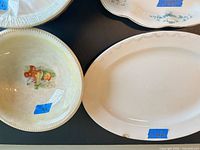 Top view of oval platter showing blue floral border and fruit center