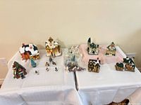 Group view of all village buildings, trees, figurines and cords