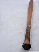 Full view of antique wooden baseball bat