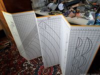 Full view of four-panel folding Deluxeboard opened, showing grid and curves