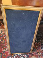 Front view of framed velvet jewellery board