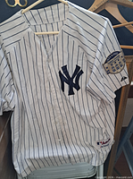 Front view showing NY logo, pinstripes, sleeve patch, jock tag