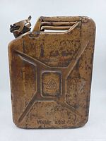 Full view of tan WWII German jerry can with embossed markings