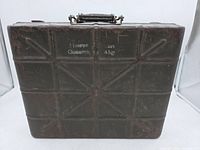 Front view showing crate, grid pattern, paint and markings