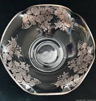 Top view showing silver overlay floral decoration on clear glass bowl