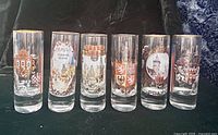 Front view of all six Prague-themed shot glasses