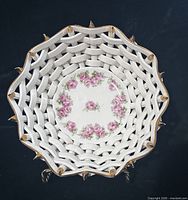 Top view Max Roesler bowl showing lattice work, rose garland centre, gold accents