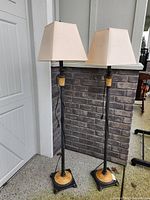 Full view both floor lamps with shades