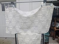 Both curtain panels displayed on rod