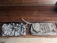 Front view of both clutches showing designs