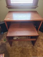 Main desk with secondary table nested underneath