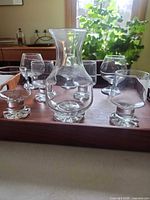 Full view of carafe and six snifters on tray