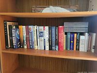 Shelf with full row of hardcover books