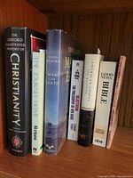 Shelf view showing all six book spines