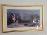 Front view of framed print showing artwork, mat and gold-tone frame