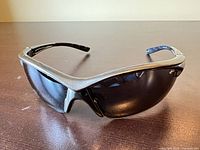 Front view of black wraparound sunglasses