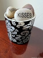 Planter with three engraved stones visible front view