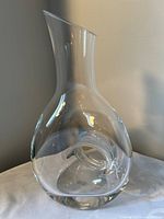 full view of sculptural glass vessel upright